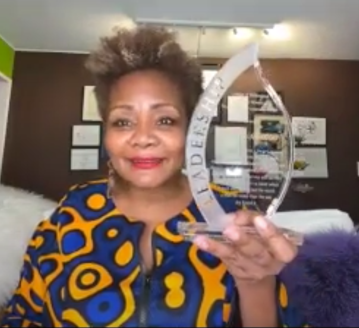 Screenshot of Tonya Pinkins holding award