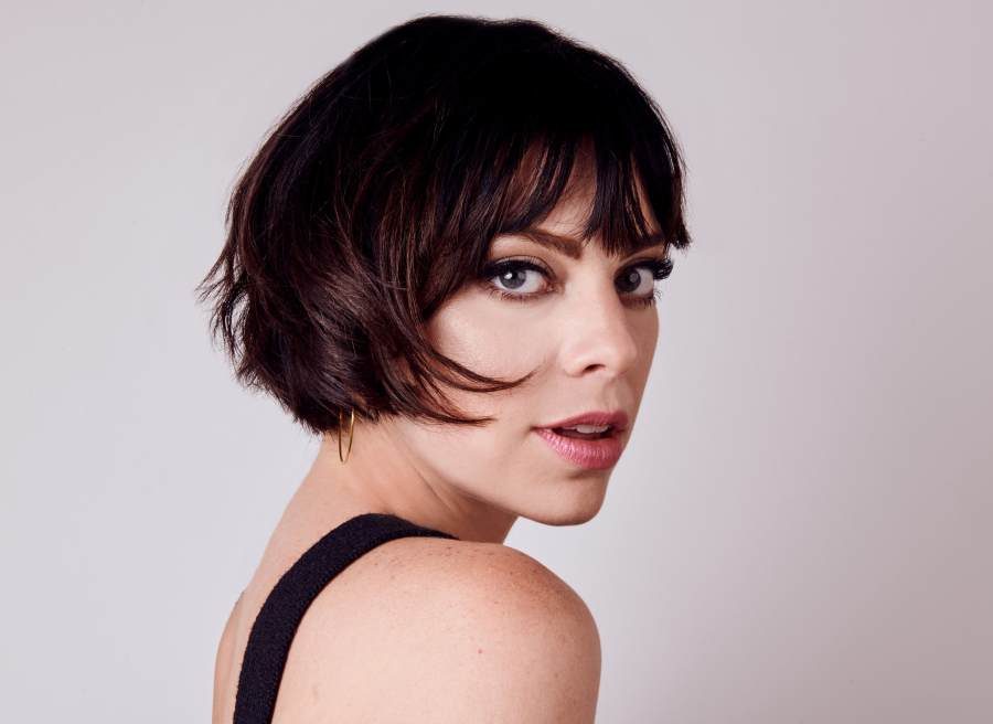 Headshot of Krysta Rodriguez